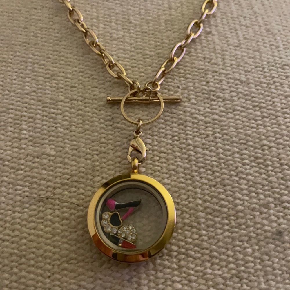 Faux gold toggle necklace with charms